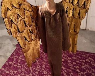 Lot 2529. $38.00. Who doesn't need an angel? This lot includes 6 angels. One is a wood carving wall hanging, pair of white iridescent angels, pair of kissing angels, and a tall slender angel (19").