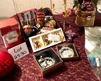 Lot 2530. $60.00 All the ornaments! Sweet little ornament tree, and ornament 18 ornaments, ornament tree with candles, one ornament is a Lenox Holiday Home Chair, 3 are hummel ornaments. 1 peacock, 2 baskets.