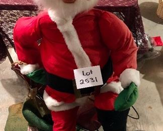 Lot 2531. $23.00. Santa Claus by Annalee with Sleigh. Santa looks like he was up all night partying, lol.