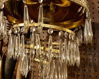 Lot 2542 $300.00. Incredible brass and crystal chandelier. 4 tiers. I didn't have time to get all the crystals in, but there are a lot of crystals in a box.
