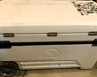 Lot 2551 $30.00 Igloo Glide Roller 110 Qt Premium Cooler Needs a Good Cleaning. Needs a nice cleaning but the inside is almost Pristine