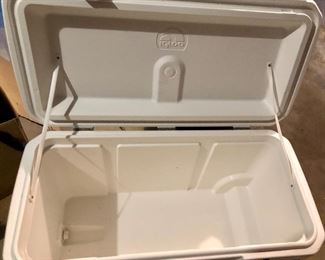 Lot 2551 $30.00 Igloo Glide Roller 110 Qt Premium Cooler Needs a Good Cleaning. Needs a nice cleaning but the inside is almost Pristine