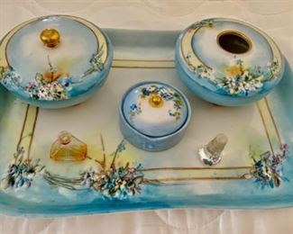 Lot 2343 $165.00 B&C France Hand-painted Limoges porcelain 7 pc dresser set. pin dish, cotton dish, trinket dish (with teeth) 1919 12" x 8.5" tray. Signed by artist, This is a beautiful set -