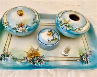 Lot 2343 $165.00 B&C France Hand-painted Limoges porcelain 7 pc dresser set. pin dish, cotton dish, trinket dish (with teeth) 1919 12" x 8.5" tray. Signed by artist, This is a beautiful set -
