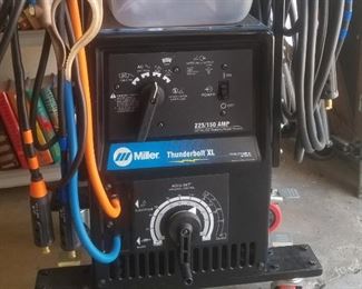 Miller Thunderbolt xl225 AC/150 DC  stickwelder, with a matching cart, and accessories