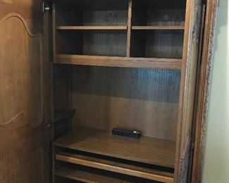 Heckmann Computer Workcenter, One Piece, Height Seven Feet Four Inches, Sides Height Six Feet Ten Inches, Width Four Feet, Depth Twenty-One and Five Inches, Pull Out Keyboard & Printer Shelf, Two Pocket Doors, One File Drawer, Adjustable Shelves, One Wrist Rest, Electrical Receptacle