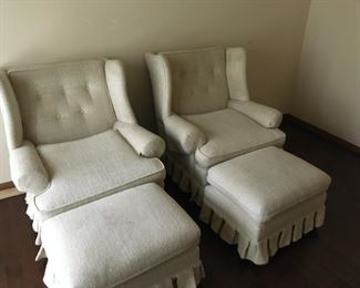 Off-white upholstered chairs with ottomans, $60 ea