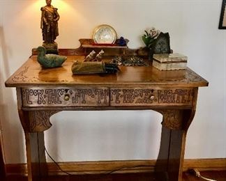 Arts and crafts desk with a inscription.  