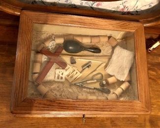 Beveled glass top locking display cabinet with sewing memories. Sold as one piece.