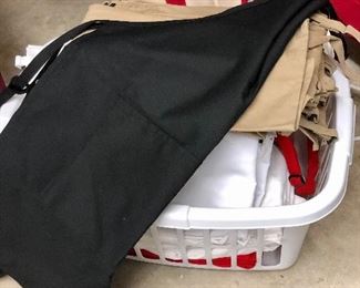 Full box of new, never worn chefs aprons. 