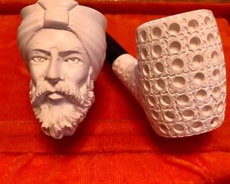 Vintage block meerschaum hand carved pipes. Made in turkey. Box is collectible on its own. Pipes depict a sultan and carved latticework, appear never removed from box. 