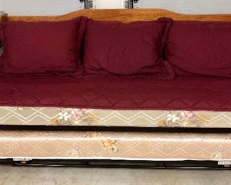 Twin Trundle bed.  Bottom pulls out and lifts. Can be used together or separately. 