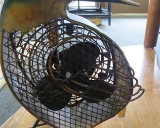Decorative hummingbird metal table fan.