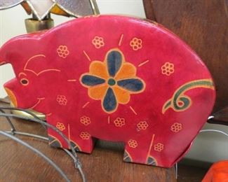 Leather pig coin bank.