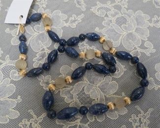 14 kt gold bead and lapis necklace.