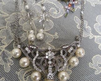 Sterling silver necklace and earrings.