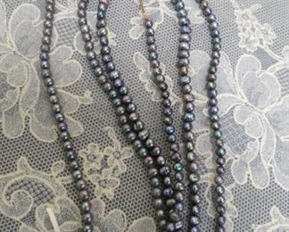 14 kt gold and grey fresh water pearl necklaces.