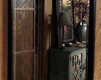 Curved top black mirror