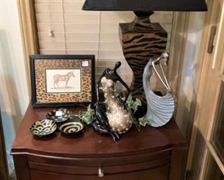 One of two nightstands and lamps; pretty lady statues