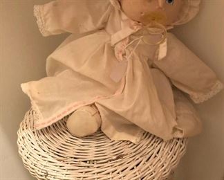 Cabbage Patch doll; white wicker stool