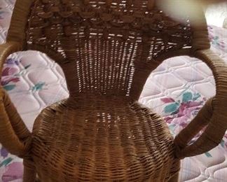 107. Child's or doll wicker chair $