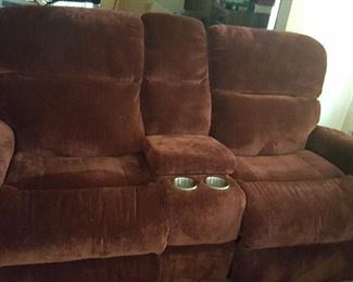 30. .Brand new electric reclining love seat  with cup holder $600. bought brand new from kettle river never got to use had a stroke and went to nursing home. 