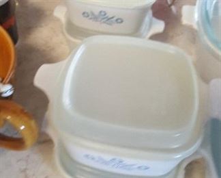 430. 4 vintage small casserole dishes with plastic lids $