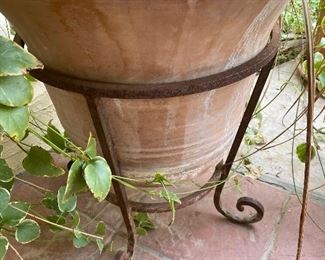 Terra-cotta planter with plant & wrought iron stand 20in diameter 23 in tall