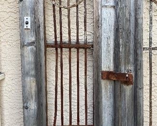 Old rustic wood and iron entry doors yard/garden art sold together 95in tall 22.5in wide each door HxWxD