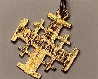 Jerusalem stamped yellow gold pendant. 1 inch by .9 in 14k