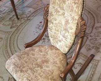 antique upholstered rocking chair