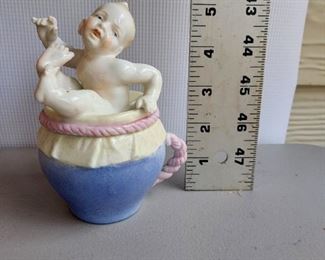 Unmarked Baby Cup? / Condiment Cup? Area for Spoon to come out of cup, baby's bottom shows on underside of lid $10 