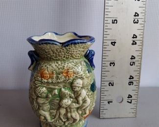 Cherub vase $12