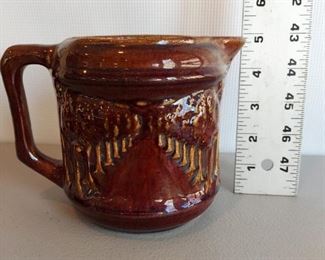 Ceramic pitcher $12