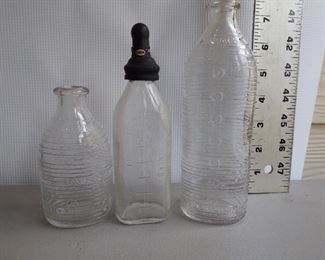 Glassware, rubber nipple on bottle intact $55