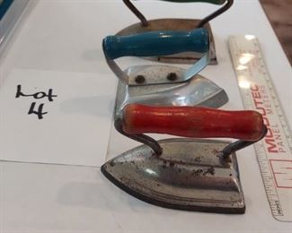 Mini Sad/Child's Iron Lot 4: 3 Piece Colored Handles. 2 Sad irons (blue/red), 1 appears to be child's toy (green).  $35