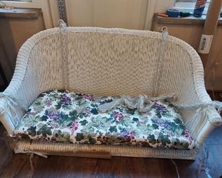 New porch swing
White wicker with floral cushion 
$400