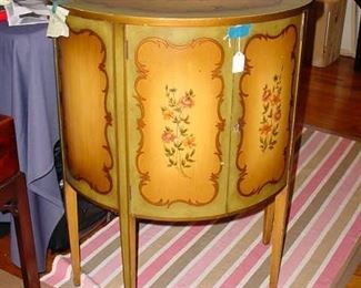 Elegant half round turn of the Century table with two front doors