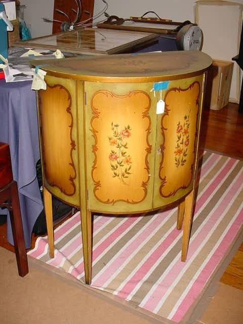 Elegant half round turn of the Century table with two front doors