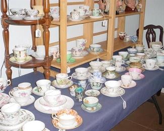 Dozens of old cups and saucers