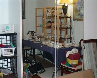 There are two of these double glass door cabinets