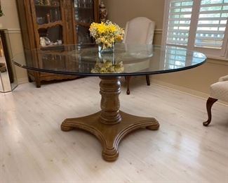 7. Round wood and glass table. 59”R x  30”H    $295