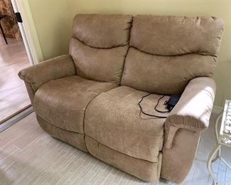26. Lazy boy Electric recliner love seat 62”D x 38”D x 39”H $250