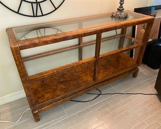 37. Faux burled wood and glass console. 49.5”L x 14”D x 29”H. $175