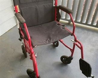 65.  Outside folding wheelchair  $40