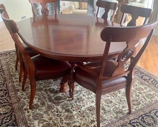 Ethan Allen Dining Set. Two captains chairs, four side chairs, table with leaf.