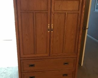 Stanley Light Oak, King  8 piece Bedroom set. This photo features 3 drawer Armoire with storage on top also included in 8 piece King Set. $1000.00 for all 8 pieces!!  Buy complete set and all pillows, comforter, and window valance included at no charge.   Will Separate.