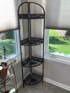 Corner black metal shelves with decorative glass inserts $ 25.00