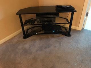 Black glass shelves,  stand for electronics $ 50.00