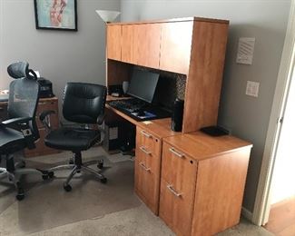 Premiera Office Furniture 2 piece desk,  hutch and file cabinet. Includes track light and tack board under hutch. 2 piece set $350. Will separate if necessary. 